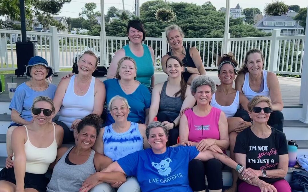 a group of smiling people after a curious movement class.